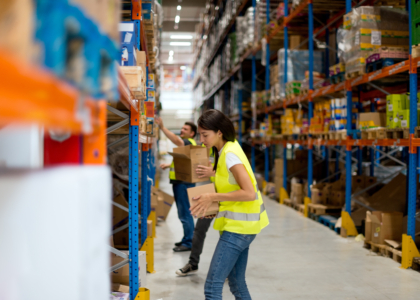 warehouse workers stocking shelves