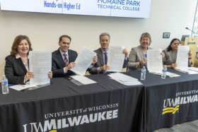 college leaders sign transfer agreement