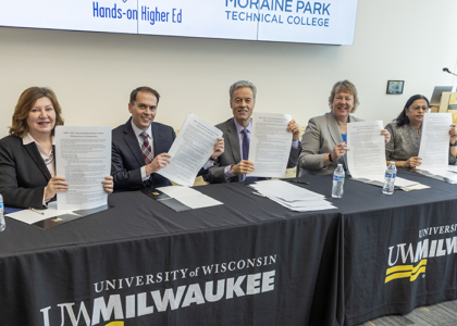 college leaders sign transfer agreement