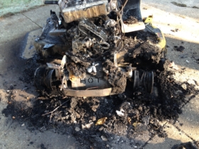 Burned garden tractor